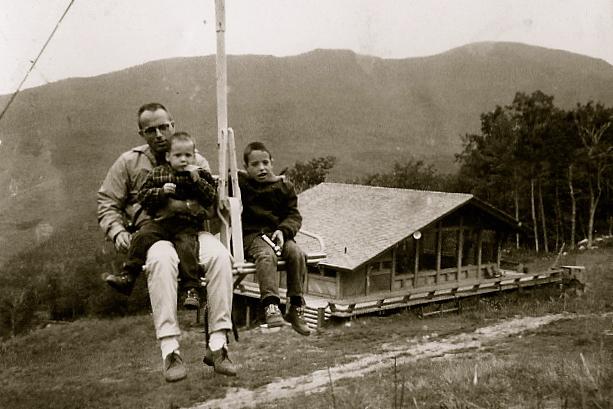 sc001689a6.jpg - Again, saftey back then was not a prime objective, I don't exactly remember if we ever put down the saftey bars.  But there were certainly up here.  And the nice glossy color post card of the lift does not show anyone with the saftey bars down either.