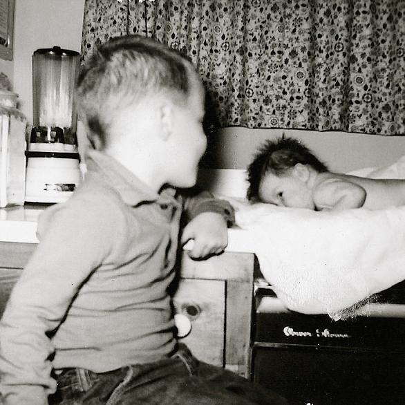 sc0017a59c01.jpg - Dan was very interested in this little bundle and even then was planning all the torment he could bring to his new sister.