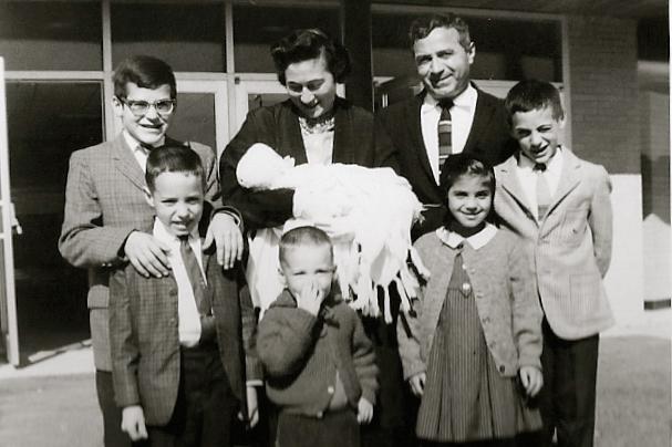 sc0017c110.jpg - Kathy's Baptism at St. John's in Perinton. Edie and Al Dipaola, and their two youngest sons Greg and Doug.  Edie is Kathy's God Mother.