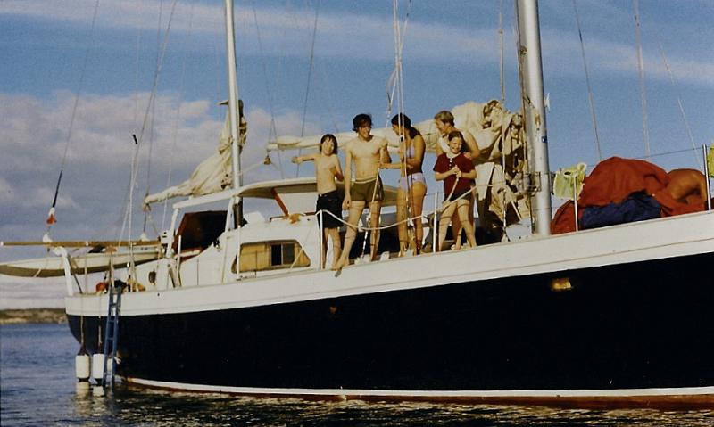 sc0003d68a.jpg - We all go swiming.  Mark is so excited to jump in the water that he jumps in with his glasses on and looses them.  Luckily he has brought a spare pair with him.