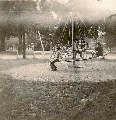 sc0001f172_2.jpg - Herbie, Kathy and Dan playing on one of the coolest playground equipment I've found anywhere, and it was here in the Newton Park.
