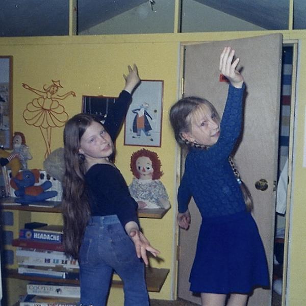 sc000d1d14.jpg - Kathy was always dancing.  Here she is with her friend Jenny Harter performing in the little room Dad made for Kathy in the area we used to have our playroom when we were small.